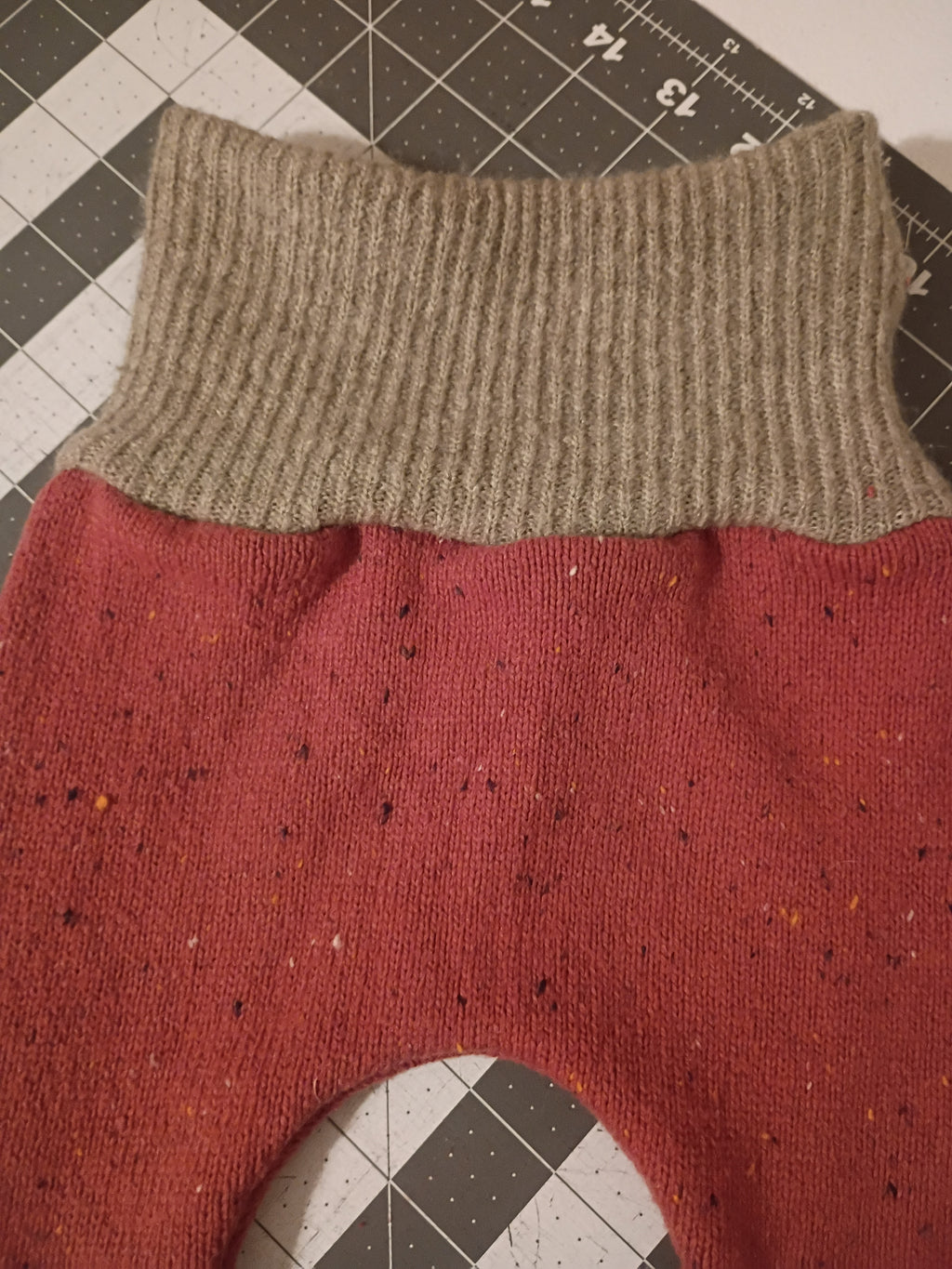 Burnt Orange/Red with Sage Green Bands, Growing Babies Sweater Buns