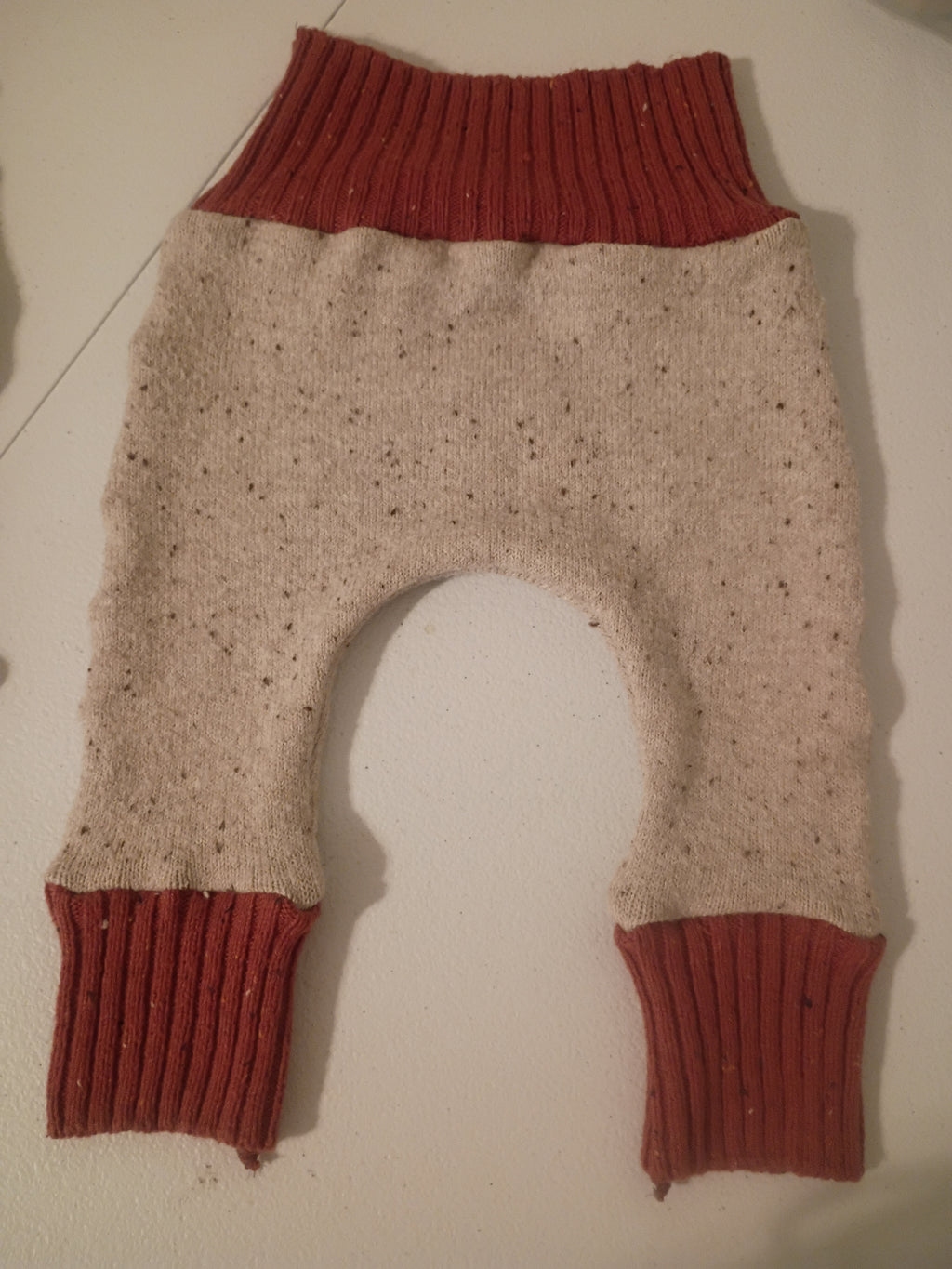 Beige with Deep Red/Burnt Orange Bands, Growing Babies Sweater Buns